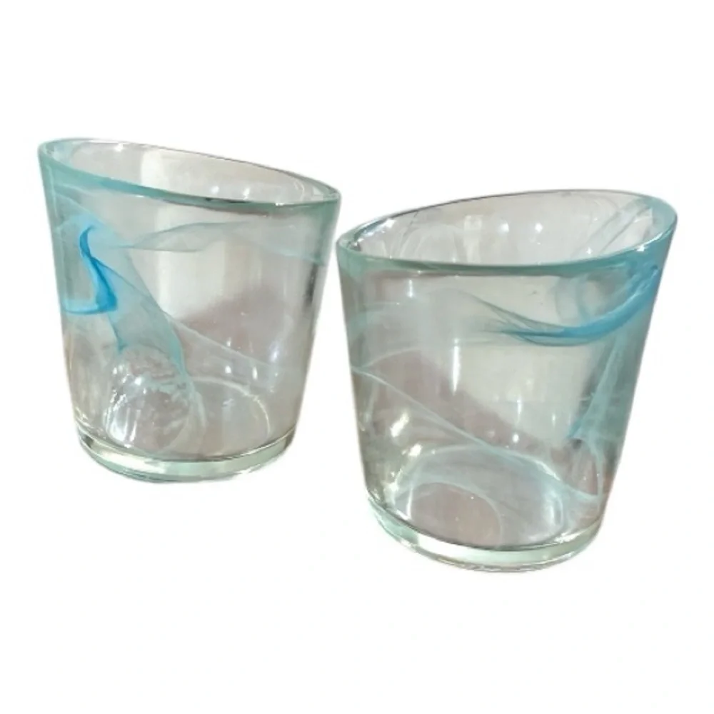 Blue swirl tea light holders with asymmetrical edges, unsigned